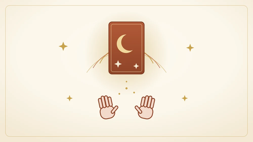 Carte de tarot à la lune accueillie par deux mains ouvertes — tarot et reiki avec La Table du Voyant